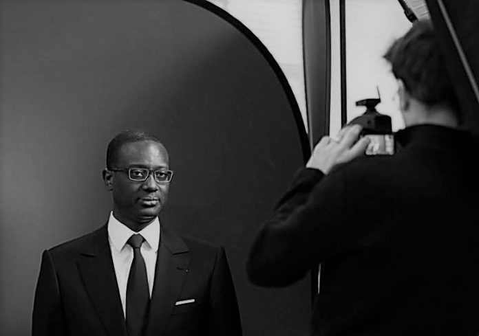 Thiam poses to a photographer after the Credit Suisse news conference in Zurich