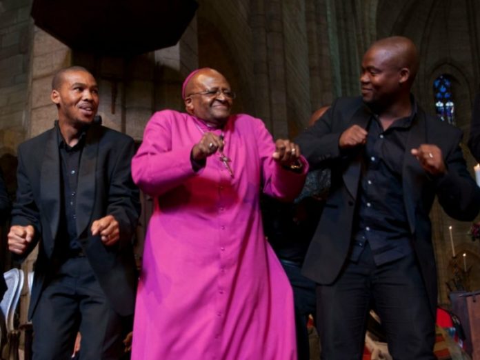 Desmond Tutu dancing